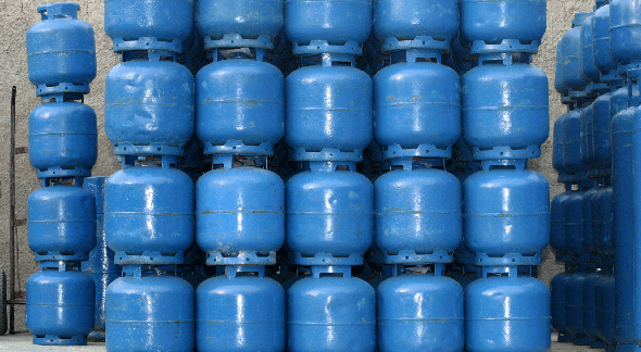 Vale Gás: vários botijões de cozinha na cor azul empilhados - Divulgação